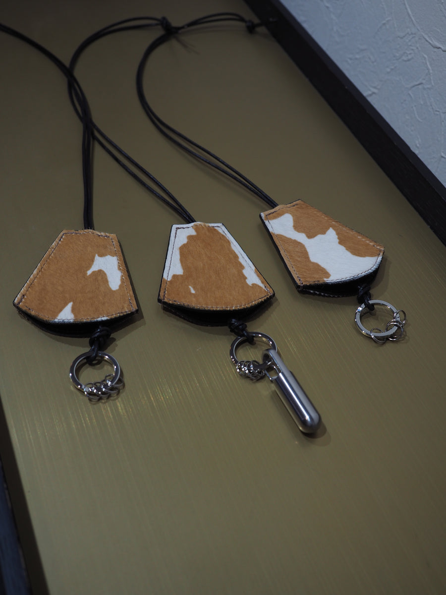 BELL Necklace Holstein ( hair calf )