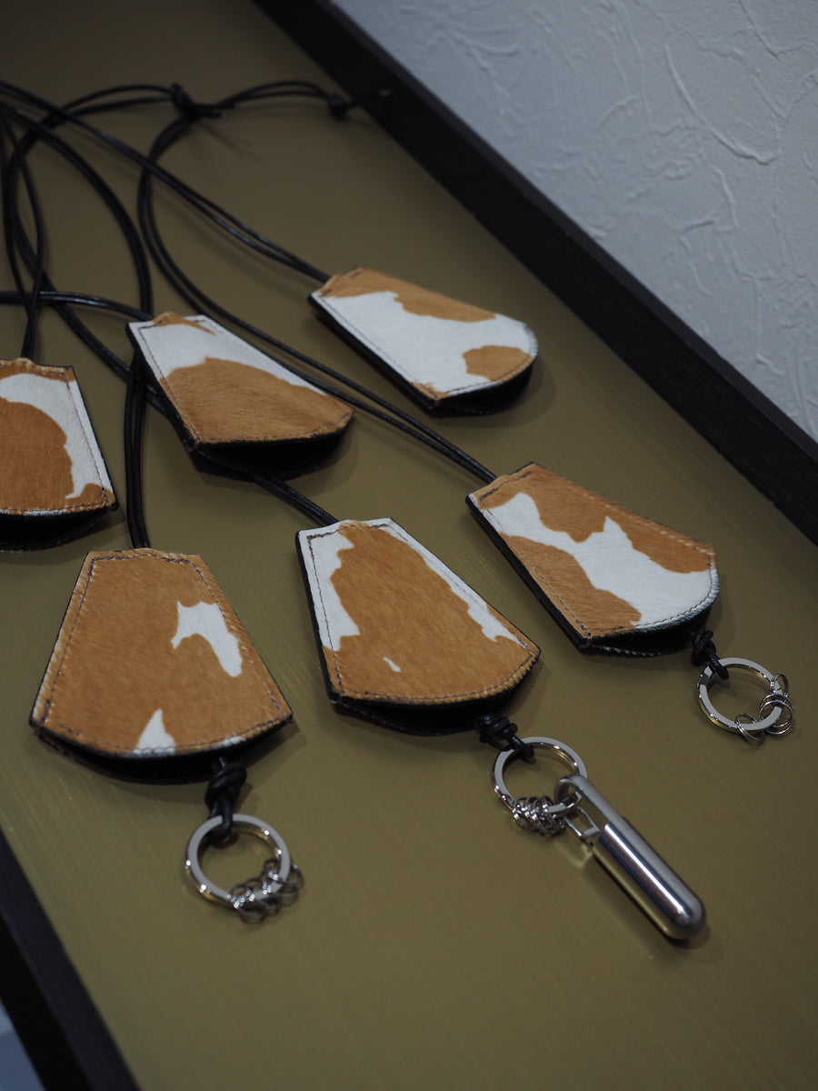 BELL Necklace Holstein ( hair calf )