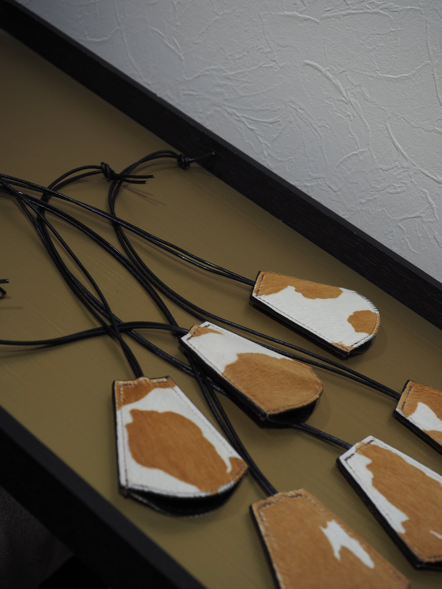 BELL Necklace Holstein ( hair calf )